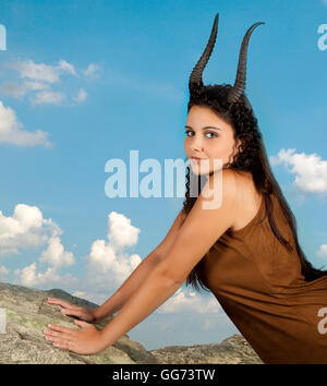 Capricorn or Goat woman, this photo is part of a series of twelve Zodiac signs of astrology Stock Photo