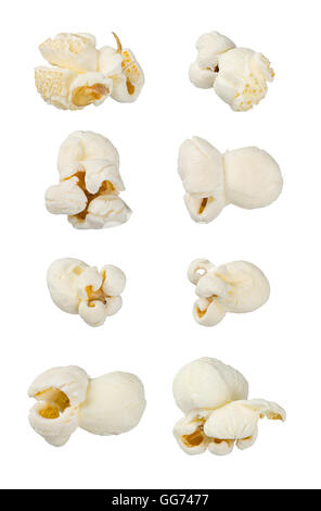 Single popcorns isolated on white. Extra large macro set. Extreme close up. Junk food, dessert, snack concept. Stock Photo