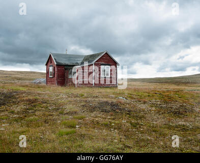 A worn down cottage on the mountrain Stock Photo