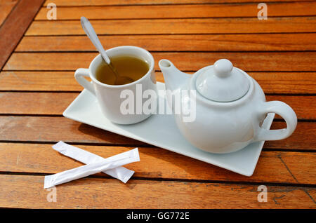 Close-up of the teacup and the teapot Stock Photo