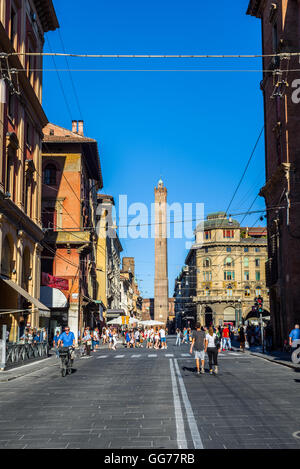 Via Ugo Bassi street of Bologna with Two towers, Garisenda and degli Asinelli in background. Emilia-Romagna. Italy. Stock Photo