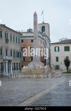 Jesi Marche Italy. Frederik II square, built over the Roman forum. Sight over the fountain-obelisk Stock Photo