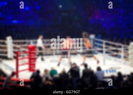 Blurred boxing fight. Abstract sports background with bokeh Stock Photo