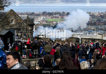 Crowd of people watching the firing of the One O'clock Gun in Edinburgh Castle, Scotland. Stock Photo