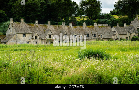 Arlington Row historic former weavers cottages in Bibury ,Gloucestershire, Cotswolds ,England Stock Photo