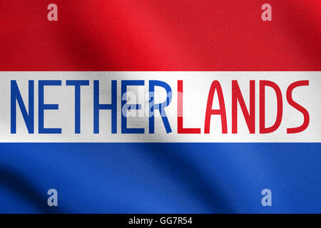 Flag of the Netherlands waving in the wind with detailed fabric texture. Word Netherlands. Stock Photo