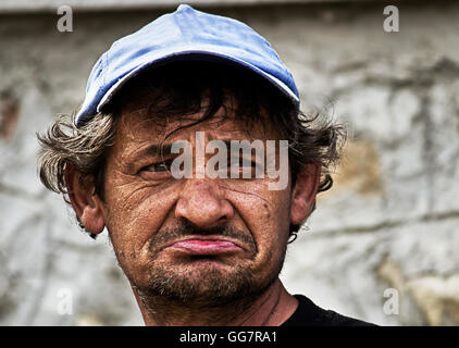 Sad homeless man Dragan effect  portrait Stock Photo