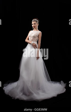beautiful young bride on a black background Stock Photo