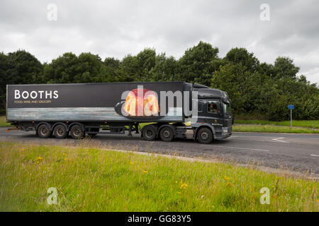 Booths supermarket Delivery. food truck van approaching depot in ...