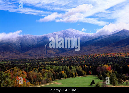 View of Mount Washington from the MT Washington hotel in New Hampshire in the fall with fall colors and snow capped mountains Stock Photo