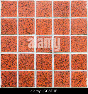 mosaic made of modern red ceramic tiles with squares and white border in rectangular form Stock Photo