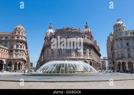 Fountain at Piazza De Ferrari in Genoa, Italy with the headquarters of the Ligurian Region building in the background, Italy Stock Photo