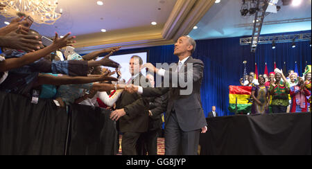 Washington, District of Columbia, USA. 3rd Aug, 2016. United States President Barack Obama greets attendees as he arrives at a Young African Leaders Initiative (YALI) town hall at the Omni Shoreham Hotel in Washington, DC. August 3, 2016. Credit: Chris Kleponis/Pool via CNP Credit:  Chris Kleponis/CNP/ZUMA Wire/Alamy Live News Stock Photo