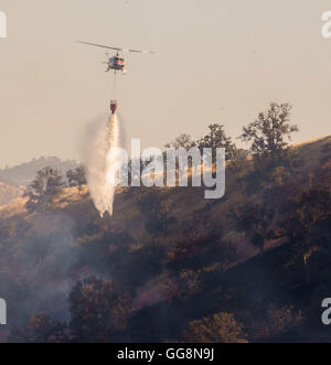 Diablo Grande, CA, USA. 3rd Aug, 2016. CalFire tanker 74 looks for his ...