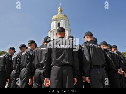Kiev, Ukraine. 4th Aug, 2016. Ukrainian Police officers stand after an official ceremony dedicated to the celebration the Day of the National Police of Ukraine on St. Sophia Square in Kiev, on 04 August, 2016. © Serg Glovny/ZUMA Wire/Alamy Live News Stock Photo