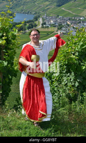 Kesten, Germany. 9th Aug, 2016. Sven Finke posing in a vineyard near Kesten, Germany, 9 August 2016. The law student was crowned wine king on 12 August 2016. For two years, the 25-year-old will campaign for the wine of the 350-people-village dressed as 'Bacchus', the Roman god of wine. PHOTO: HARALD TITTEL/dpa/Alamy Live News Stock Photo