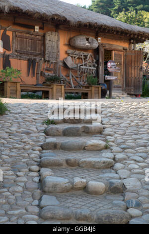 Traditional Korean Farm House with Stone path - Day Stock Photo