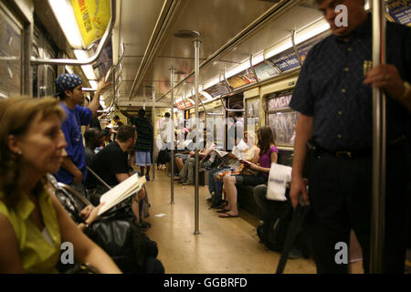 In a subway car with passengers Stock Photo