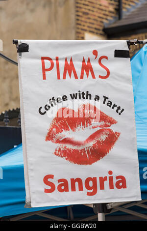 Pimm's coffee with a tart Sangria poster at Columbia Road market place, London UK in July Stock Photo