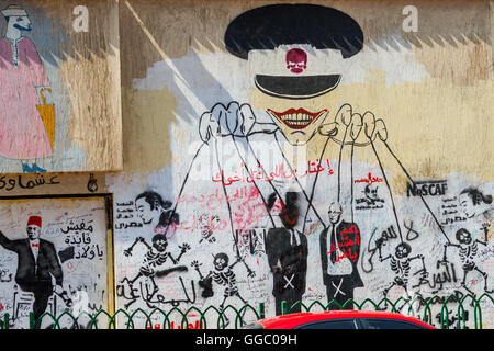 Egypt, Cairo, graffiti of the Egyptian revolution on Mohamed Mahmoud Street. The puppetmaster. Stock Photo