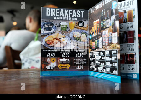 A menu card from a JD Wetherspoons pub in Central Birmingham. The card shows the prices of the breakfast options available in the pubs until midday Stock Photo