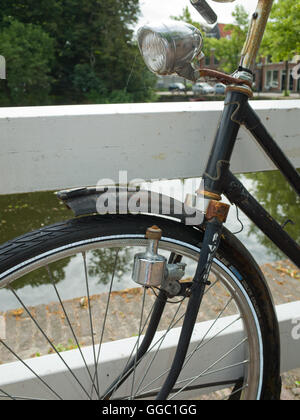 Dutch bike with old style dynamo lamp Stock Photo