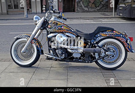 A highly customized Harley Davidson Motorcycle parked on a Dublin street, Stock Photo