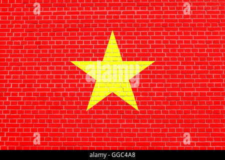 Flag of Vietnam on brick wall texture background. Vietnamese national flag. Stock Photo