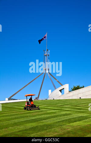 Mowing the grass on the roof of Parliament House in Canberra, the Australian National Capital Stock Photo