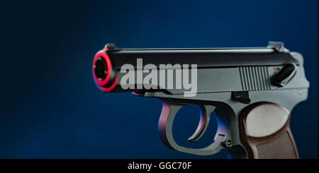 Air gun on dark blue background Stock Photo