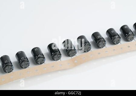 Electrolytic capacitors on a white background Stock Photo