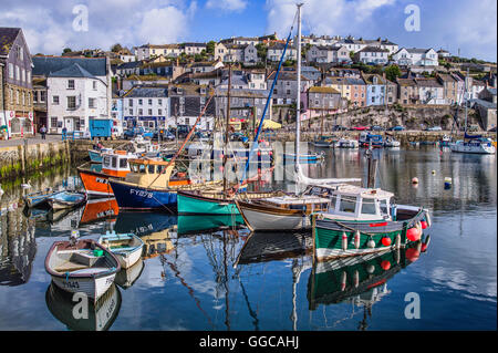 Fishing boats fill Mevagissey harbour in Cornwall UK Stock Photo