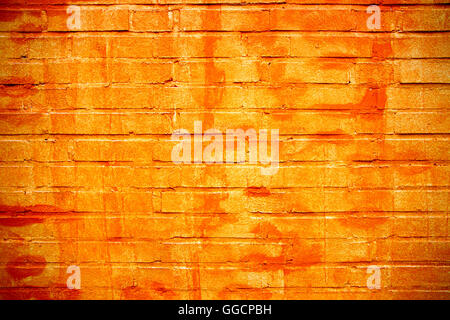 brick wall in orange colors as a background Stock Photo