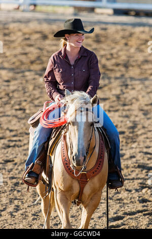 Cowgirl on horseback; Chaffee County Fair & Rodeo, Salida, Colorado, USA Stock Photo