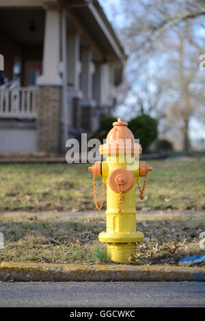 Fire hydrant on suburban street Stock Photo