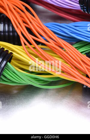 Electric cables in corrugated plastic pipes Stock Photo