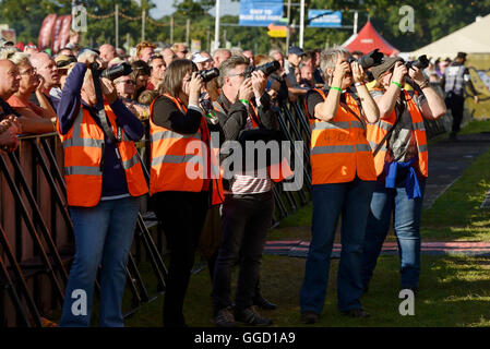 Carfest North, Bolesworth, Cheshire, UK. 31st July 2016. Photographers in the photo pit at the front of the main stage. Stock Photo