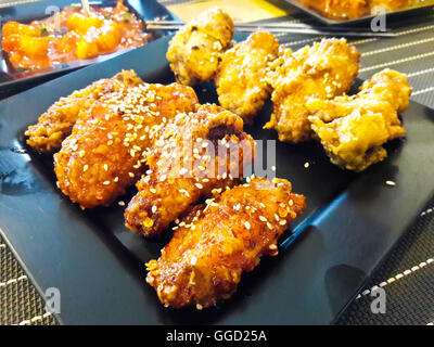 Korean fusion style deep fried chicken wings Stock Photo