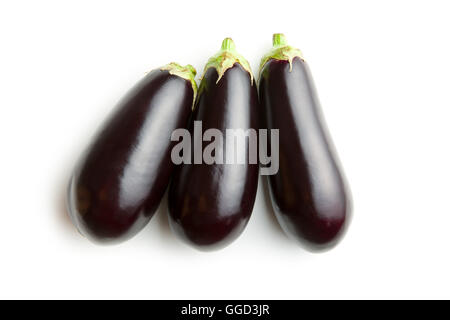 three fresh eggplants isolated on white background Stock Photo