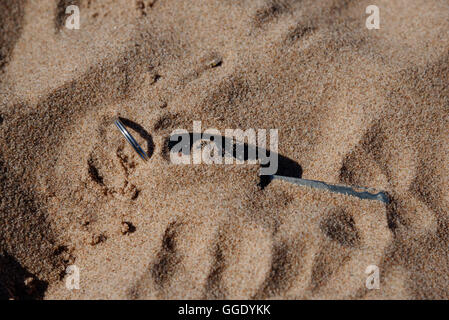 Car keys lost in the sand Stock Photo