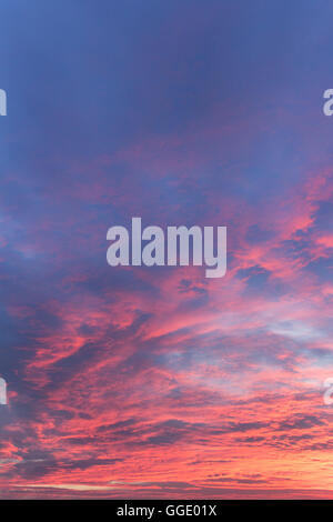 Dramatic colorful orange color sky with clouds in the evening during ...