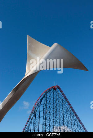 metal sculpture in front of rollercoaster at Blackpool pleasure beach Stock Photo