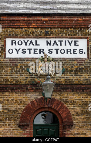 Royal Native Oyster Stores an old building with Royal crest of arms in Whitstable that supplies oysters Stock Photo