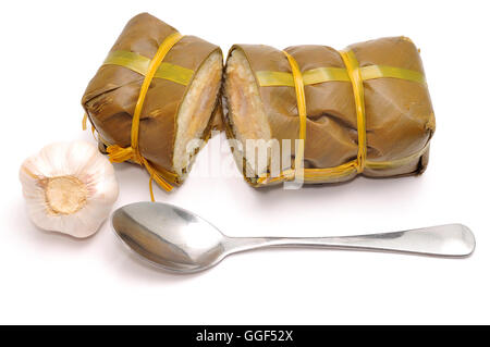 Vietnamese Cylindrical Sticky Rice Cake or Banh Tet on a white background Stock Photo