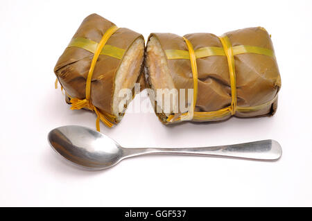 Vietnamese Cylindrical Sticky Rice Cake or Banh Tet on a white background Stock Photo