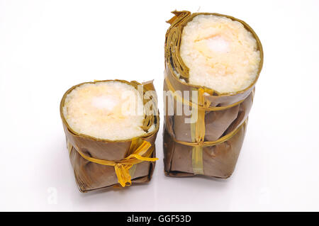 Vietnamese Cylindrical Sticky Rice Cake or Banh Tet on a white background Stock Photo