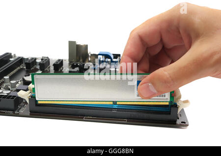 installing a memory module on the motherboard Stock Photo