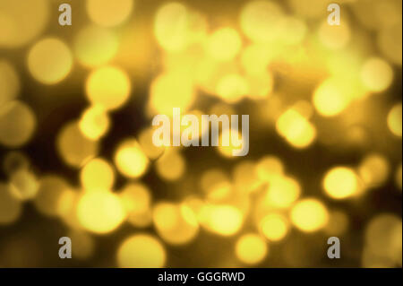 Abstract holiday gold circular bokeh background Stock Photo