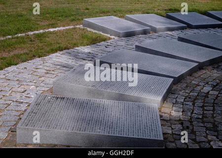 Memorial stones with names of German soldiers killed during World War II at the German Military Cemetery used for the burial of German soldiers during both world wars in the town of Klaipeda in Lithuania Stock Photo