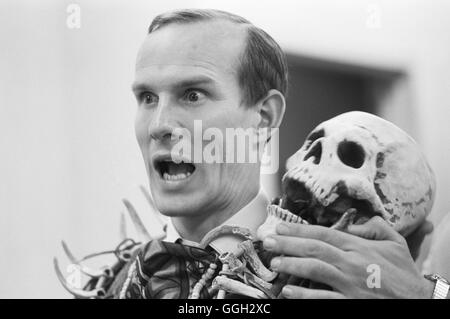 Tom Smothers, playing with props on the set of the Smothers Brothers Comedy Hour, Episode 6, which aired on March 12, 1967. Stock Photo